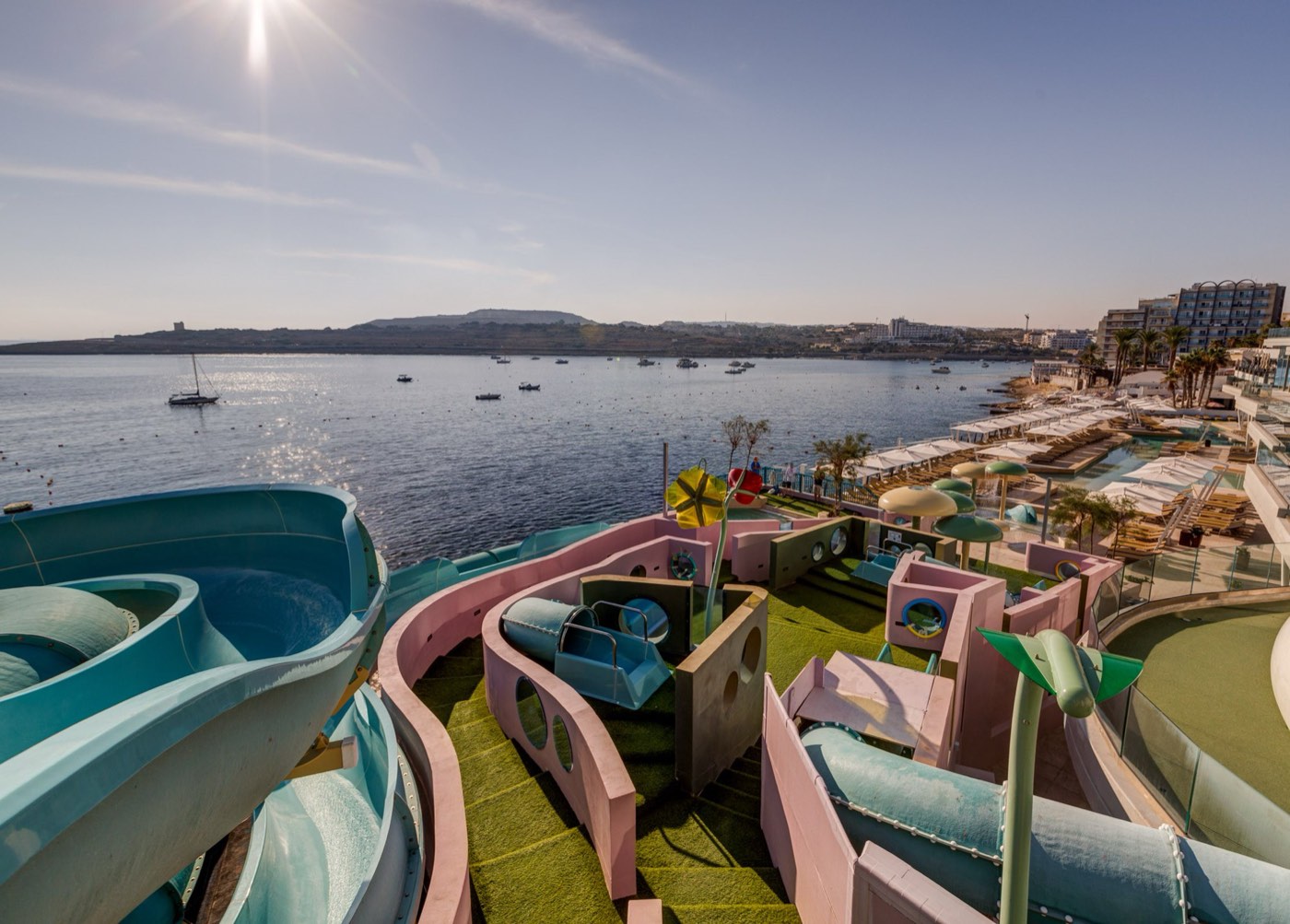 AX ODYCY Hotel rooftop water park overlooking St Paul's Bay — the Superior-Residenz for 16–17s